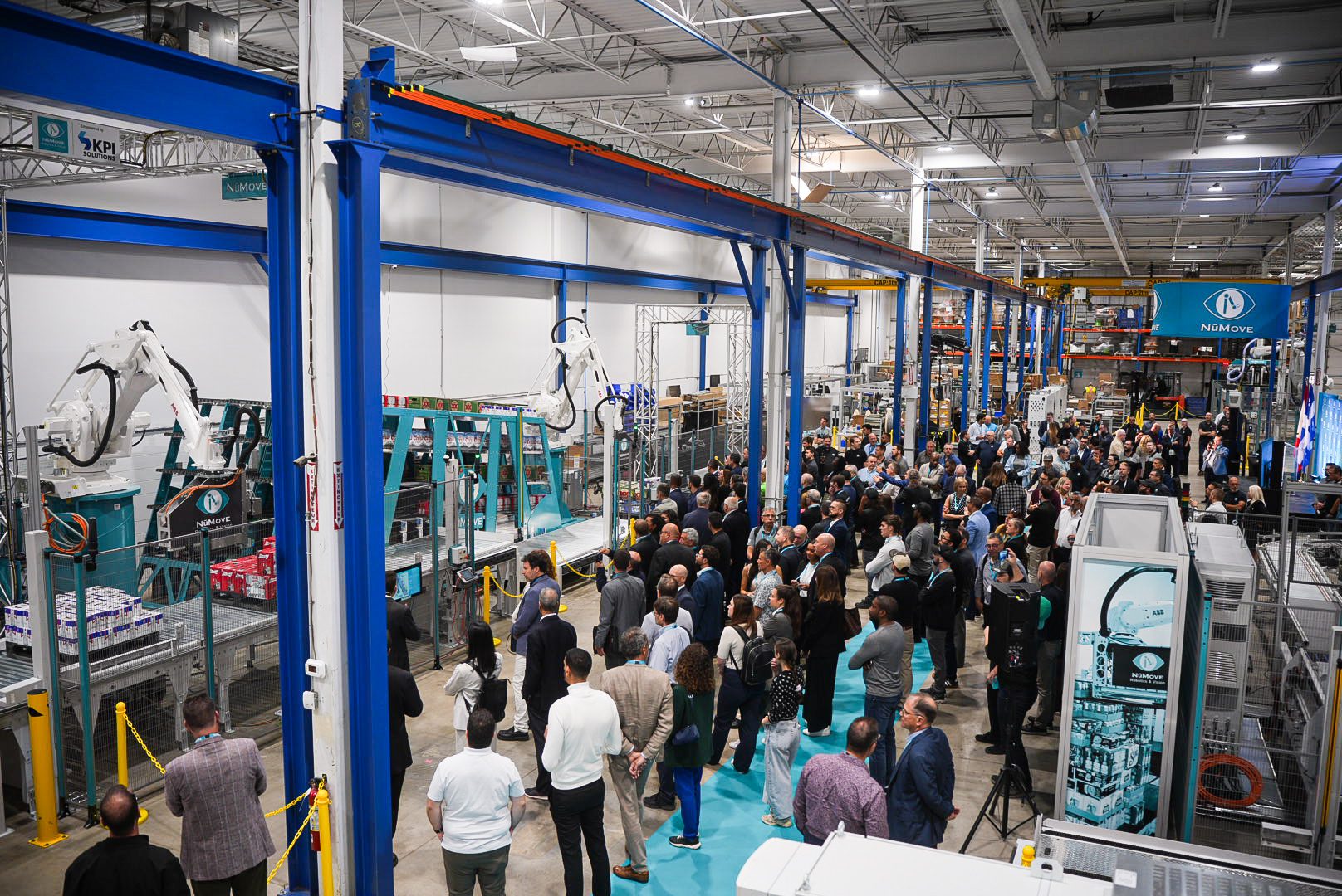 Guests watching the demonstration of solutions during the grand opening of the Center of Excellence